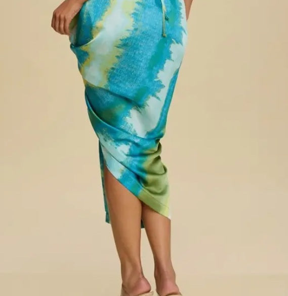Azure Escape Draped Dress — Asymmetric hem detail